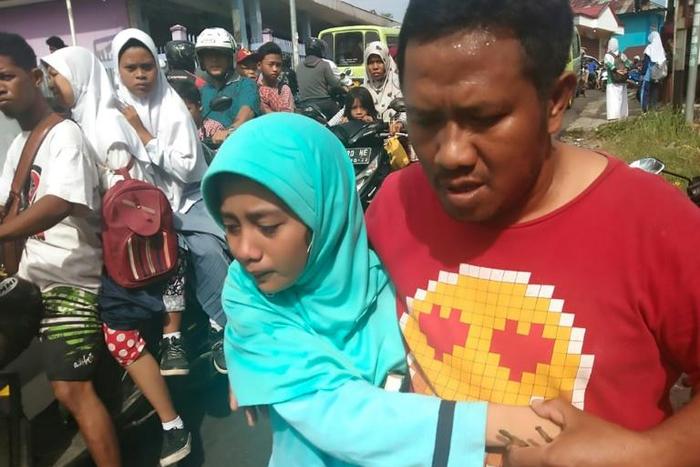 Terrified residents in Indonesia's remote Maluku islands ran into the streets as buildings fell in around them when the tremor struck