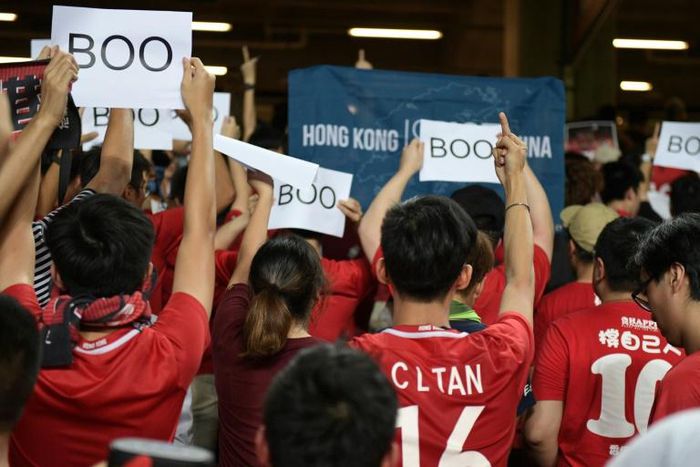 Hong Kong fans turned their backs and booed when the Chinese national anthem was played