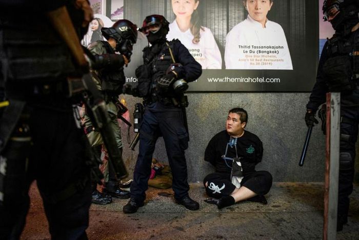 Police clashed with demonstrators at nearly a dozen locations on Sunday