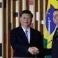 Chinese President Xi Jinping (L) and Brazilian President Jair Bolsonaro after their bilateral meeting in Brasilia on the eve of a BRICS summit