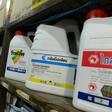 Containers of pesticide and weed killer containing paraquat and glyphosate on sale at a gardening shop in Bangkok
