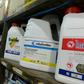 Containers of pesticide and weed killer containing paraquat and glyphosate on sale at a gardening shop in Bangkok