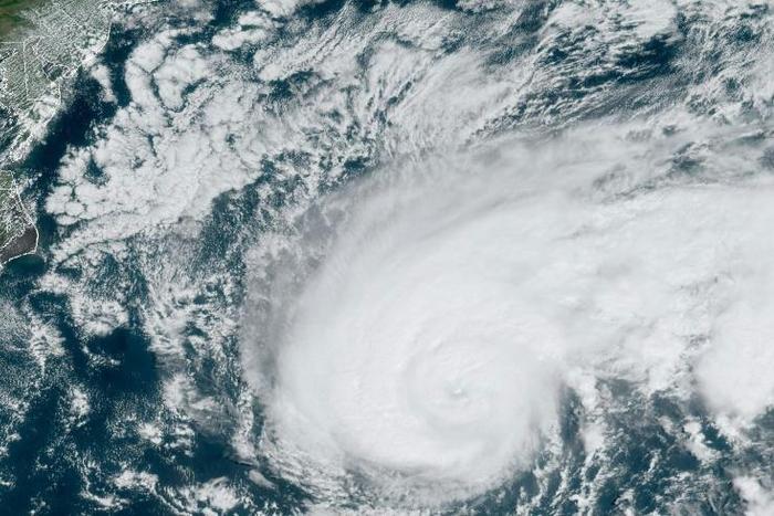Humberto moves off the US east coast in the Atlantic Ocean on September 18 in this satellite image obtained from NOAA/RAMMB