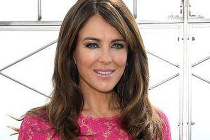 Elizabeth Hurley Uses A Chainsaw To Work Out