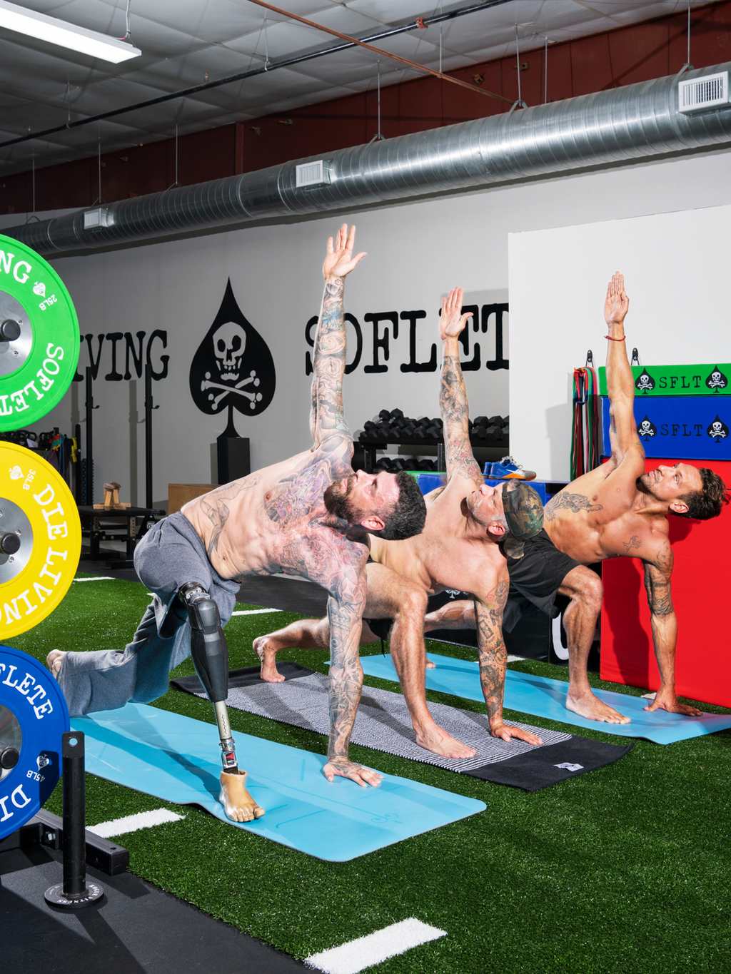 <strong>WARM DOWN</strong> Some of the SOFLETE guys stretch it out after a workout.