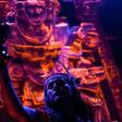 Actors perfom in front of an altar dedicated to the underworld at the "Gran Ofrenda" (Mega Offering) installed in the Chapultepec Forest in Mexico City, for Day of the Dead