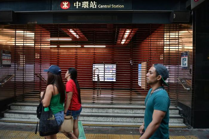 Hong Kong ground to a halt on Saturday after another night of violence