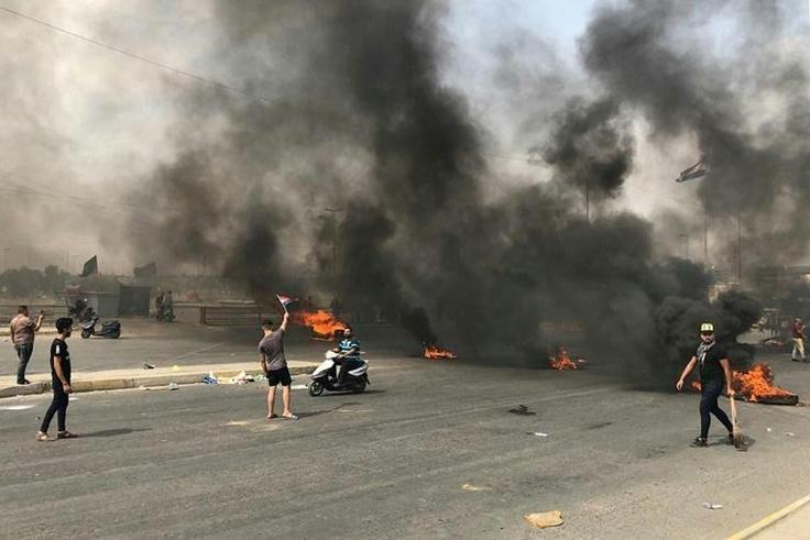 Protests erupt in Baghdad for a second straight day prompting security forces to fire live rounds in the air despite calls for restraint from President Barham Saleh
