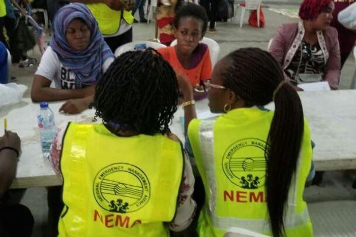 NEMA officials attending to Nigerians returnees from Libya (NAN)