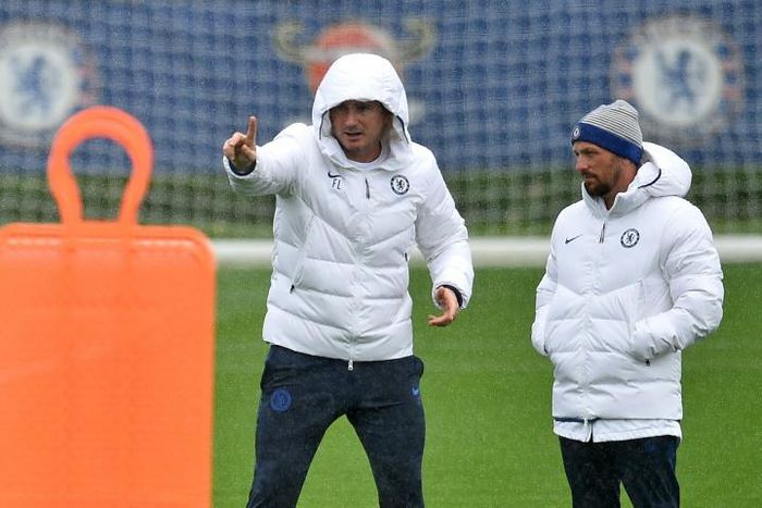 Frank Lampard (L) takes training at Chelsea's Cobham base on Tuesday ahead of their Champions League meeting with Lille