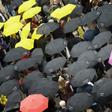 The umbrella vigil calls on the literary world to show solidarity and set an example for freedom of expression and freedom of the press