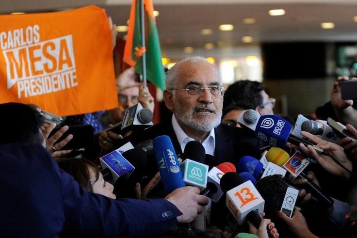 Bolivia’s opposition presidential candidate Carlos Mesa speaking to reporters in La Paz on Monday