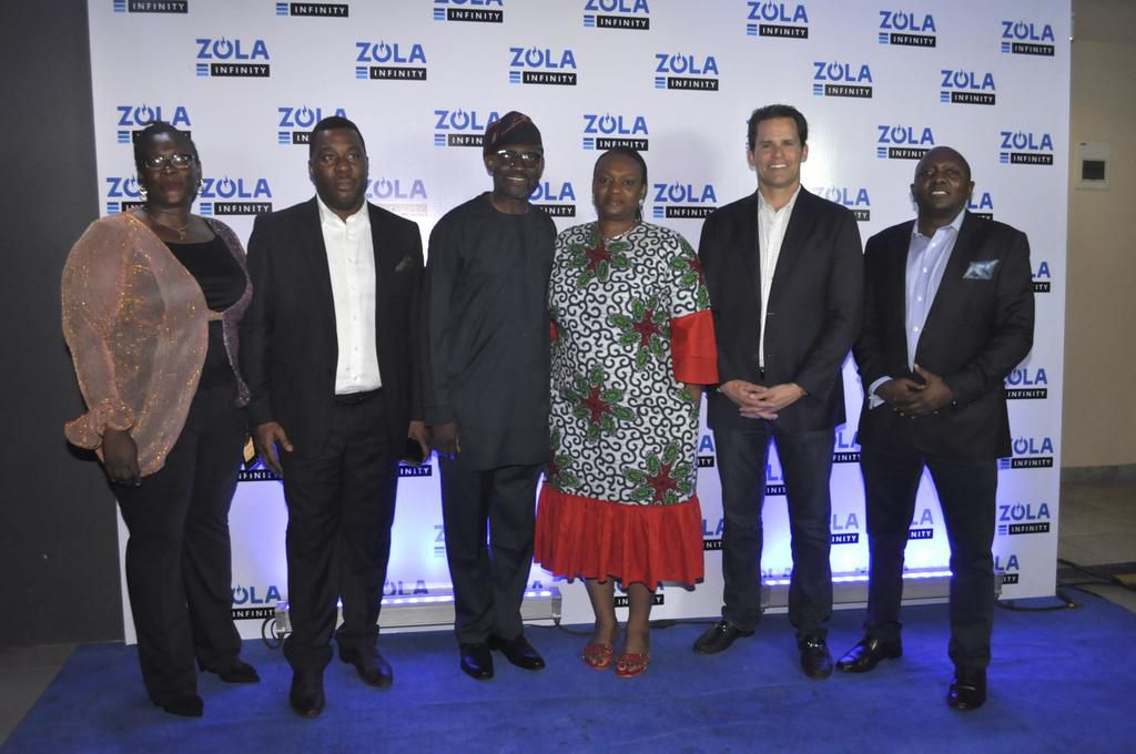 L-R, Head of Marketing, ZOLA Electric Nigeria, Mrs. Onome Odili; Chairman, ZOLA Electric Nigeria, Mr. Femi Tejuosho; 1st Customer, ZOLA Electric Nigeria, Mr. Omotayo Ajani and wife, Mrs. Olayide Ajani; Global Chief Executive Officer, ZOLA Electric, Mr....