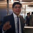 Ecuador's Foreign Minister Jose Valencia gestures after a press conference in which he announced that four opposition deputies had been granted political asylum by Mexico
