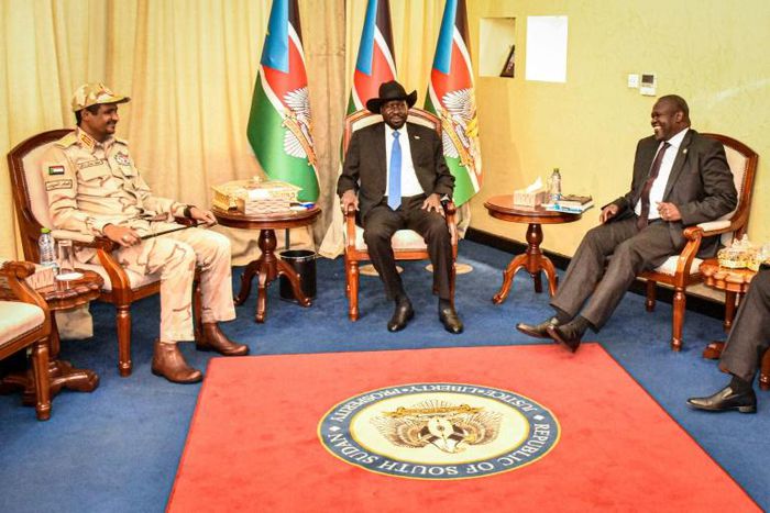 South Sudanese President Salva Kiir (centre) and opposition leader Riek Machar (right), pictured in Juba on Sunday with the deputy head of Sudan's Transitional Military Council, Mohamed Hamdan Daglo