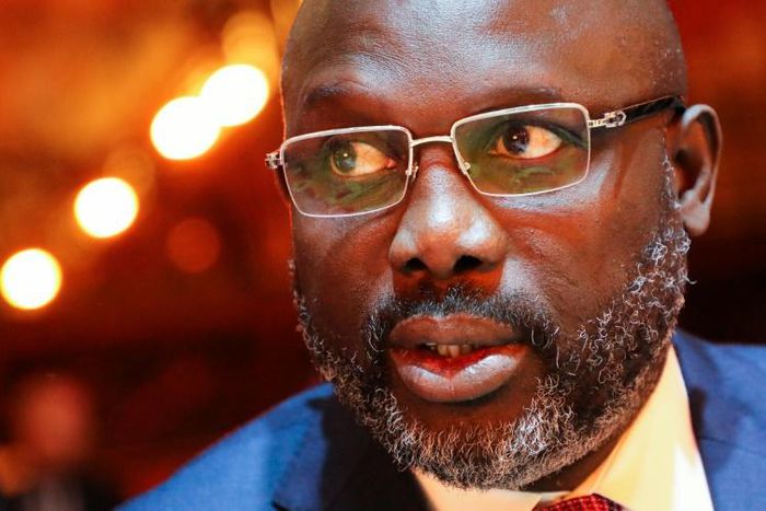 Under pressure: Football star turned president George Weah