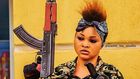 Mercy Aigbe takes on the role of an armed bandit on the new film, '77 Bullets' [Instagram/mercilicious]