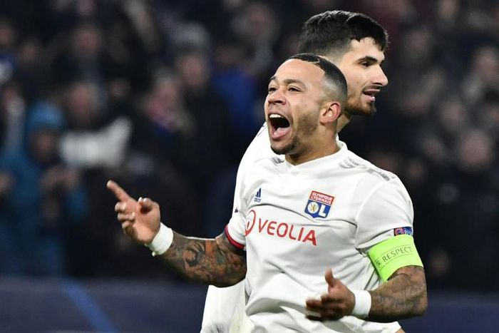 Memphis Depay's eighth goal of the season claimed a Champions League last 16 spot for Lyon