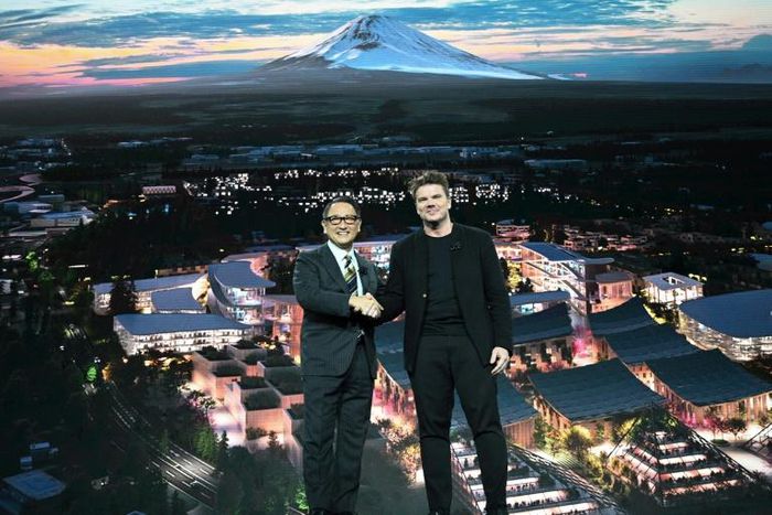 Toyota President and CEO Akio Toyoda (L) and Danish architect Bjarke Ingel reveal plans for a prototype "city" of the future at the base of Mt. Fuji in Japan during the Toyota press conference at the 2020 Consumer Electronics Show