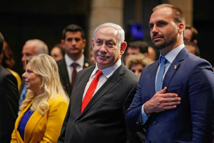 Israel's Prime Minister Benjamin Netanyahu (centre) with his wife Sara and Brazilian lawmaker Eduardo Bolsonaro at the opening of Brazil's trade office in Jerusalem on Sunday