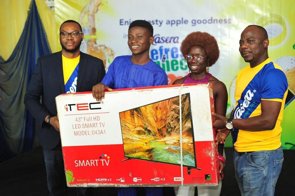 L-R: La Casera Dealer in Ibadan, Alhaja Adenekan Kudirat Wunmi of Dalec Store; iPhone X star prize winner, Oladapo Tunde Joshua and the Managing Director, The La Casera Company, Chinedum Okereke; at the Ibadan Grand Draw of the La Casera Refresh & Conn...