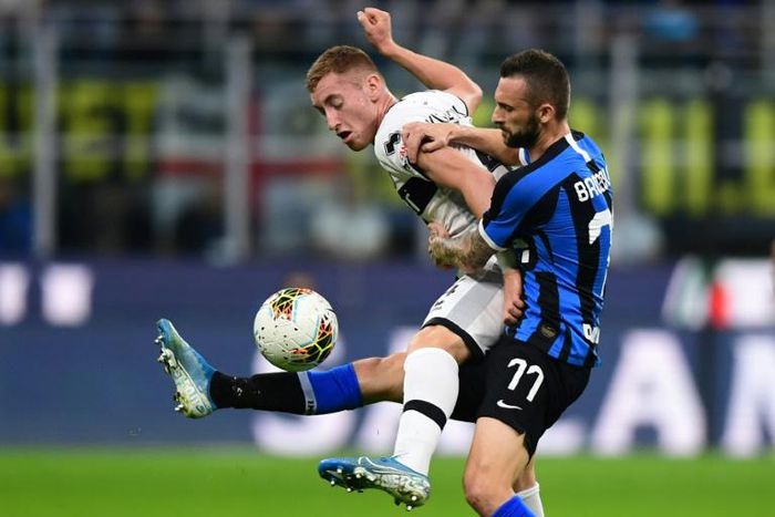 Parma's Dejan Kulusevski (L) and Inter Milan's Marcelo Brozovic during a Serie A match in October.