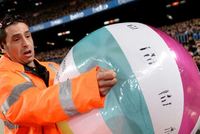 Fans threw various beach balls on to the Camp Nou pitch in Wednesday's Clasico