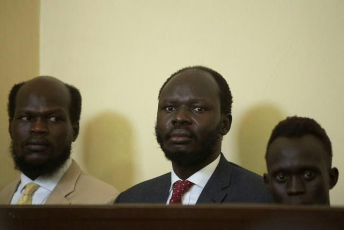 Peter Biar Ajaj (C) was convicted for  espionage, but has now won a pardon