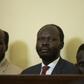 Peter Biar Ajaj (C) was convicted for  espionage, but has now won a pardon