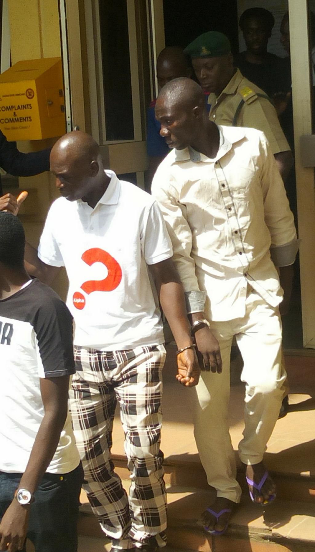 Lateef Balogun ex-domestic staff (left) and Adewale Oyekan, Lagos Prince, leaving Ikeja High Court after both were sentenced to death for murder. [NAN]