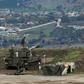 Israeli troops deployed on the annexed Golan Heights on the border with Syria
