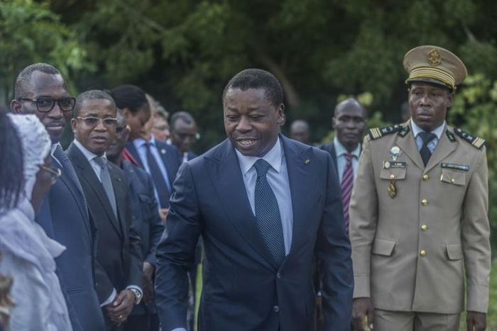 Togolese President Faure Gnassingbe (C) looks set to win another term this year