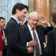 Britain's Princess Anne talks to Britain's Prime Minister Boris Johnson, Canada's Prime Minister Justin Trudeau and other NATO leaders at Buckingham Palace