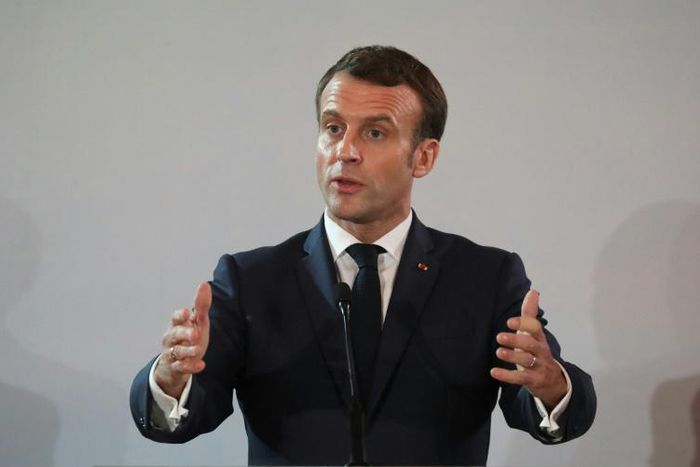 French President Emmanuel Macron speaks at the Presidential Palace in Abidjan
