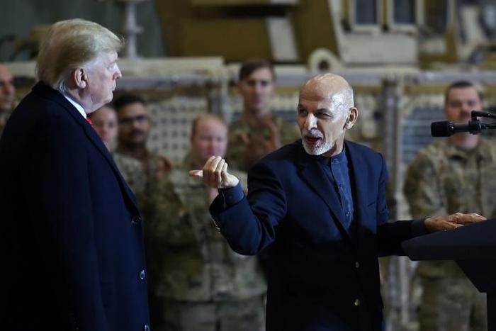 President Donald Trump made a surprise visit to Bagram on November 28 where he met with Afghan President Ashraf Ghani (R)