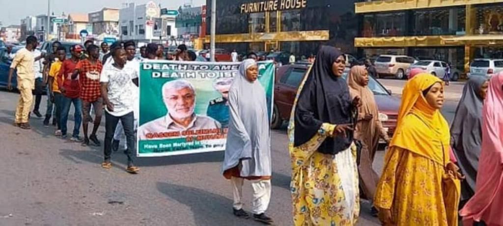 Shiites protest in Abuja, burn US flag (Twitter/@tosinadeda)