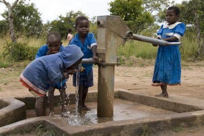 children playing with borehole/illustration (Modern Ghana)