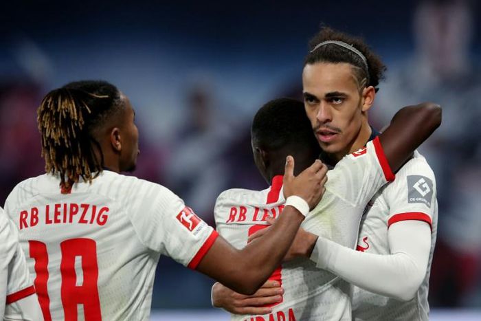 Yussuf Poulsen celebrates scoring in RB Leipzig's 3-1 home win over Augsburg