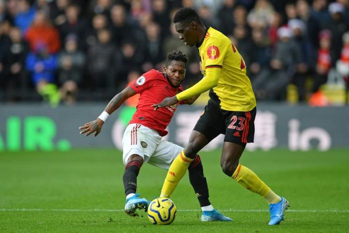 Ismaila Sarr held off Manchester United's Fred  and helped Watford to a crucial victory