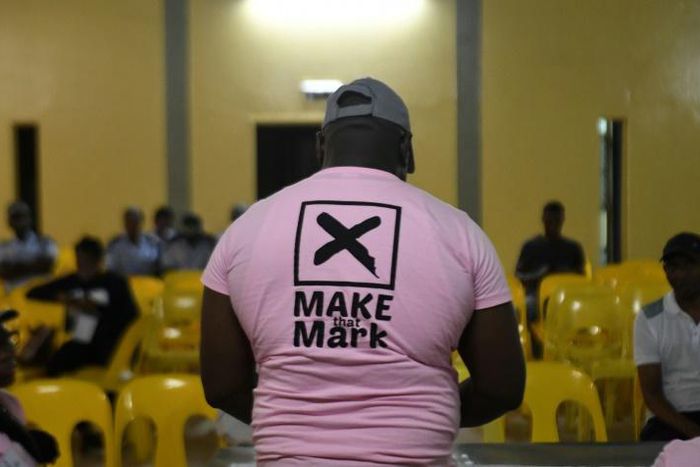 Contested election: A polling officer in Gaborone verifies ballots on voting day last October