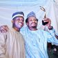 Senator Elisha Abbo (right) raises his "Beacon of Hope" award. "Beacon of Hope" was his campaign slogan before he was elected as the youngest senator in the 9th Senate. Weeks before his inauguration, he beat up and arrested a woman for telling him to c...