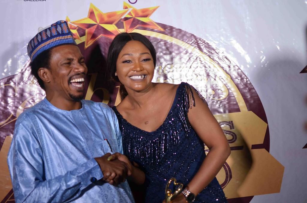 Senator Elisha Abbo (left) has resisted calls to resign from his position after a video emerged in July 2019 showing him assaulting a woman in a sex toy shop in Abuja. The incident happened in May 2019. [The Gazette Nigeria]