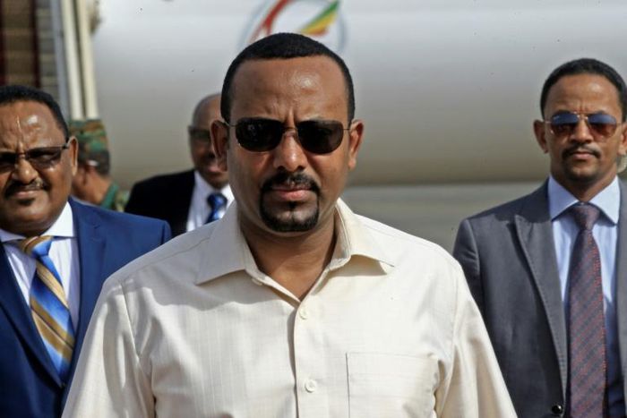 Ethiopia's Prime Minister Abiy Ahmed (C) has denounced attacks on mosques