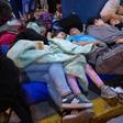 Venezuelan migrants wait to get a refugee application at a Peruvian border post in June 14 2019: the US Treasury has accused the head of a Venezuela government agency of seeling off passports for bribes