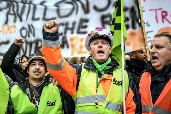 Strikers at a demonstration near Gare de l'Est train station in Paris on December 26. The reasons for strikes, analysts say, are multiple and complex, and touch on the French republic's revolutionary origins, its educational philosophy, union tradition...