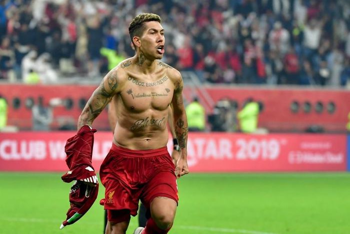 Roberto Firmino celebrates after scoring the goal that won the Club World Cup for Liverpool