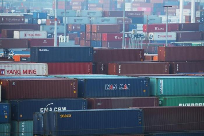 Shipping containers are stacked at the Port of Los Angeles in November 2019