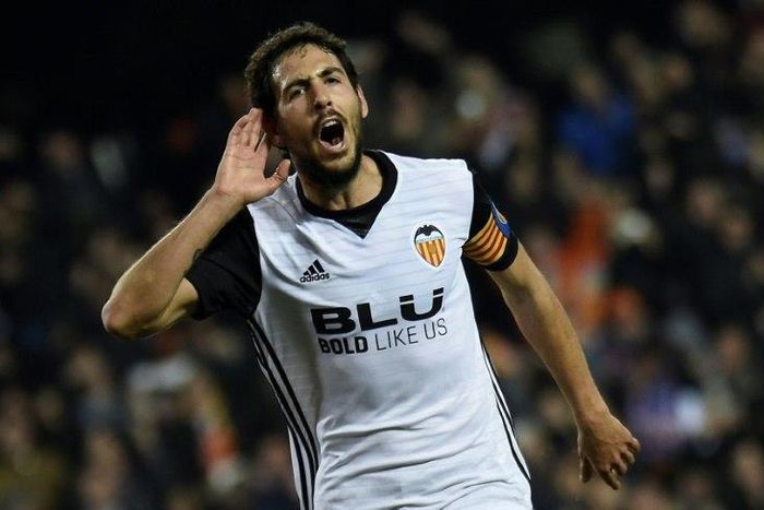 Valencia's midfielder Dani Parejo celebrates after scoring against Celta Vigo at the Mestalla Stadium in Valencia on December 9, 2017