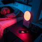 woman sleeping with red lights