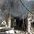 Smoke billows from a building following a reported bombardment by pro-Syrian government forces in the town of Maaret al-Numan in Syria's Idlib province, the country's last major opposition bastion, on December 20, 2019